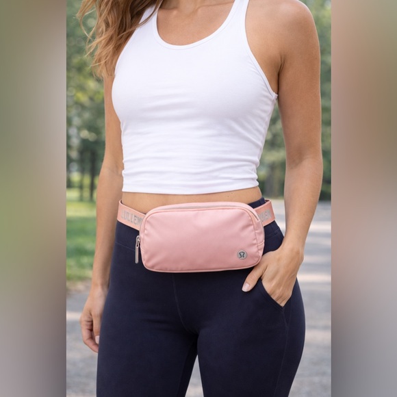 lululemon athletica Handbags - NWT Lululemon Everywhere Belt Bag 1L Pink Mist Silver Logo